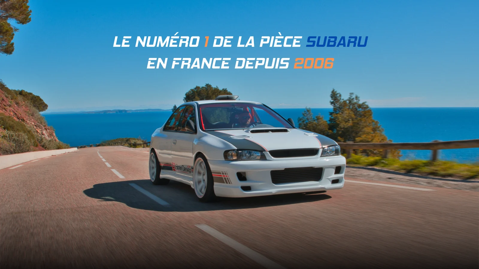 Campagne Subaru, voiture sur route côtière